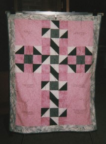 Pink and white quilt